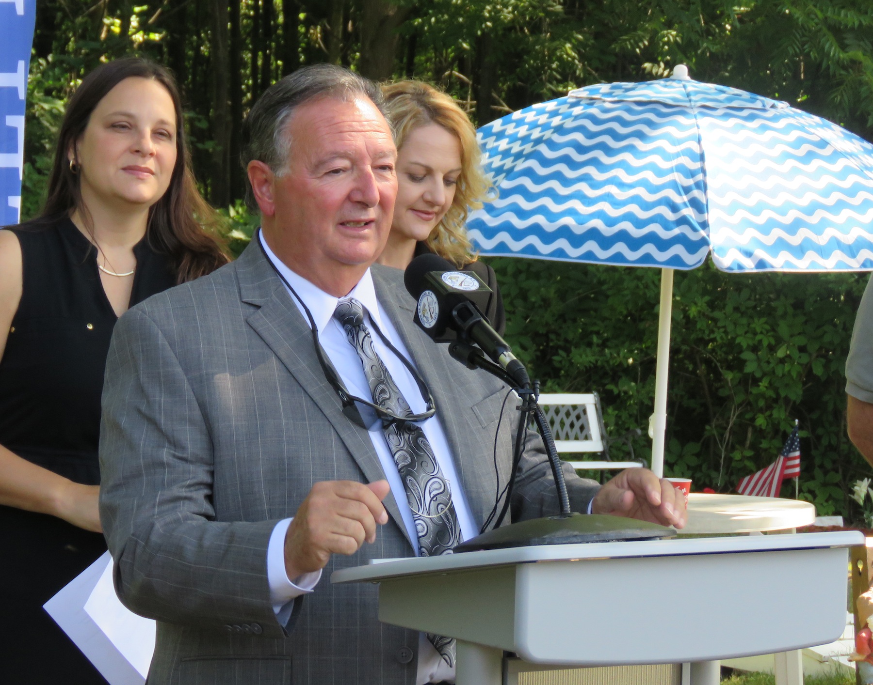 Town of Niagara Supervisor Lee Wallace speaks at Thursday's announcement. Wallace spent over three years looking for ways to restore Cayuga Creek and help alleviate some of the flooding issues around Tuscarora Road and Roberts Drive. (Photo by David Yarger)